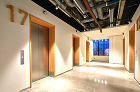 The elevator hall of a standard floor with a beautiful polished concrete floor The elevator hall of a standard floor with a beautiful polished concrete floor