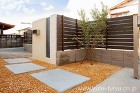 木目調の高級感あるクローズ外構へリフォー... 門まわり裏