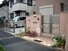 隣地目隠しフェンス プランパーツの外構施... クローズ外構 塗り壁門柱