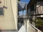 木製調目隠しフェンス ピンコロ石花壇の外... 雨除け屋根 LIXILリクシル ライザー...