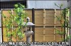 古い塀を隠し、坪庭のスクリーンとなる人工竹垣-墨田区オフィスビル