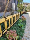 落ち着いた色合いのタイルで仕上げた門柱がポイントの和モダン外構　京都市