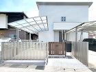 木目調とブラックでモダンな外まわりにリフ... 木目調の門扉が上質感をプラス 草津市