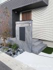 自然石調のタイルの門柱がポイントのシンプ... 自然石調のタイルの門柱がポイントのシンプ...