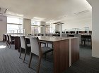 ウォールナット製の4人掛図書室デスク