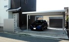 バイク倉庫のある奥行きのある駐車場 郡山... 車庫まわり 門まわり