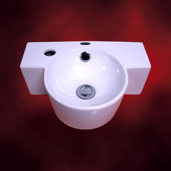 小型の洗面ボウルとミラーキャビネット