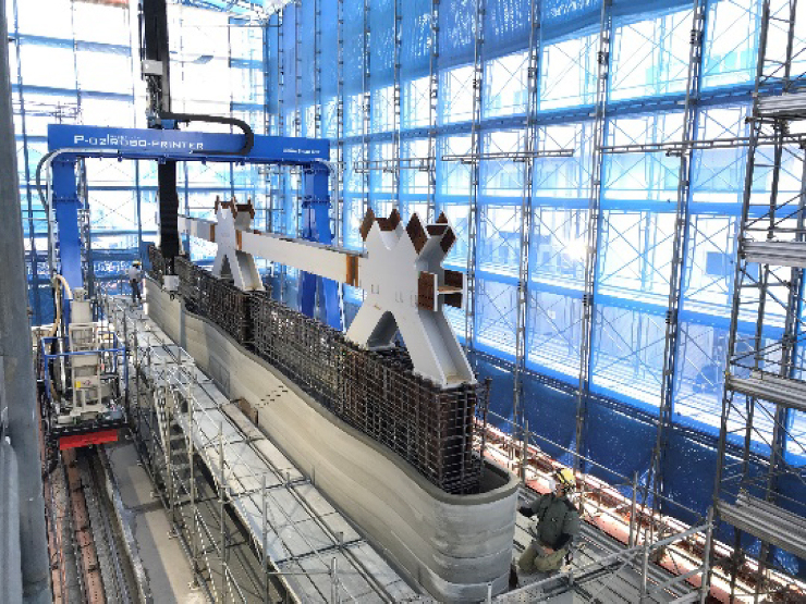 ニュースリリース：幅20m・高さ4.5mの大規模造形物を施工場所でそのまま “印刷”<br>?オンサイト建設3Dプリンタ「Shimz Robo-Printer」を新規開発?